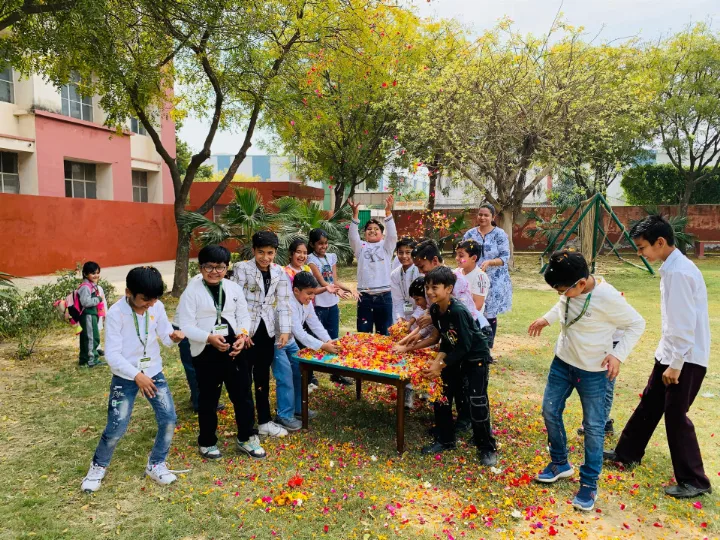 Delhi World Public School organized a colorful hand-printing activity and  eco friendly, safe holi celebrations with flowers, for its students